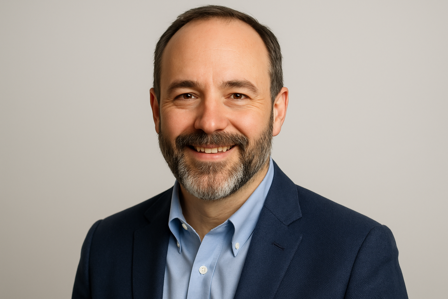 headshot of middle aged man with beard